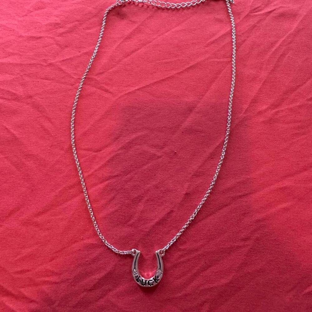 Silver toned SHA Jewelry horseshoe necklace w the word 'LUCK' 1 side & 13 stones